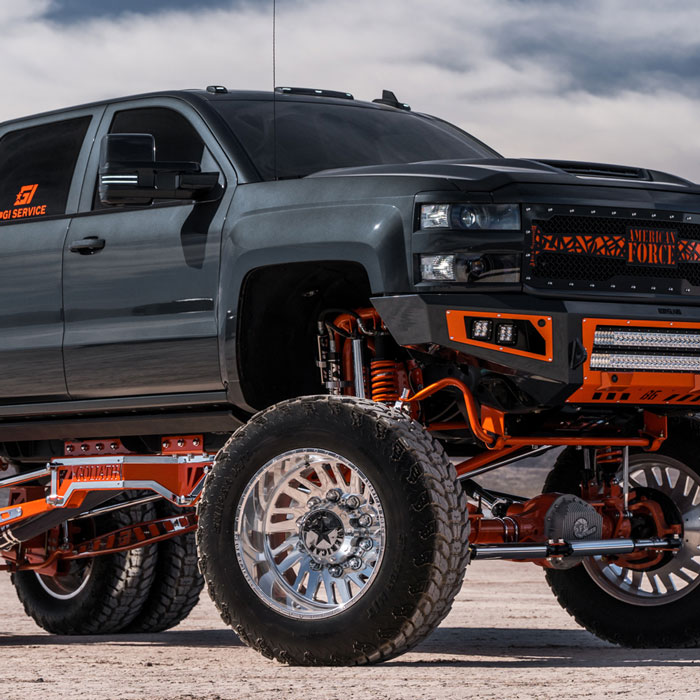 lifted truck with orange accents