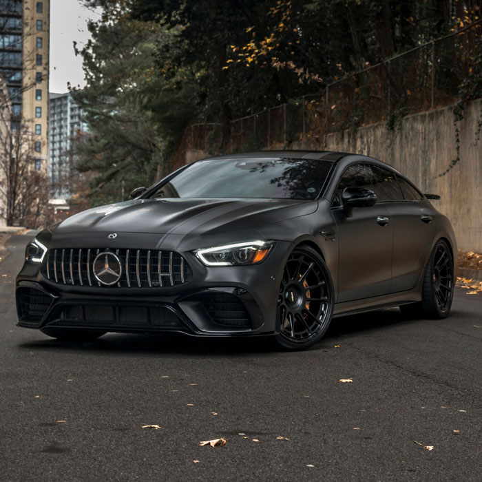 black car with black tires and rims