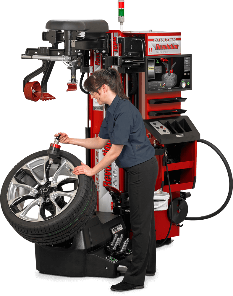 woman adjusting tire on Tre Revolution wheel lift